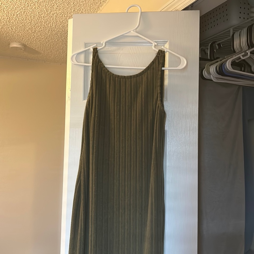 Two sundress barley worn with an open back